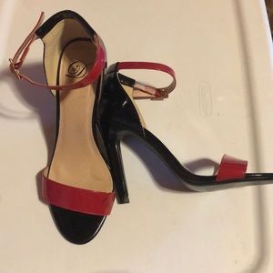 Black and red, 3inch heals. Opened toed